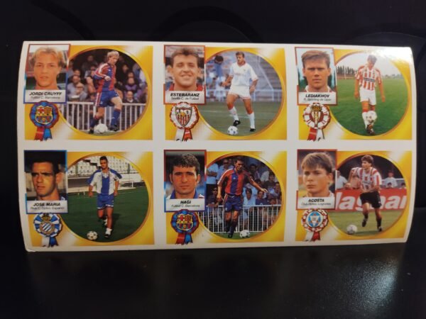 Lámina de cromos originales Liga 94-95 Ediciones Este con fotos de fichajes como Jordi Cruyff, Hagi, Estebaranz, Ledakhov, José María y Acosta.
