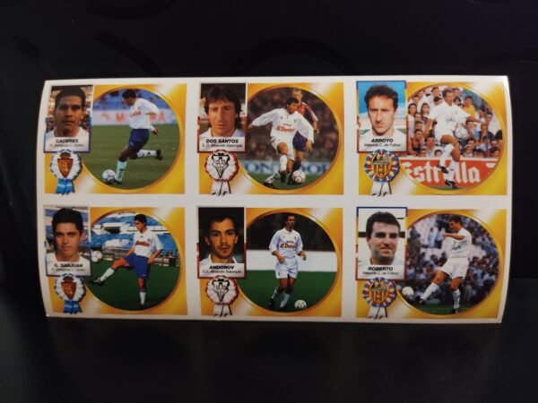 Lámina de cromos Liga 94-95 con Cáceres, Dos Santos, Roberto, Andonov, Arroyo y García Sanjuán en sus equipos originales.