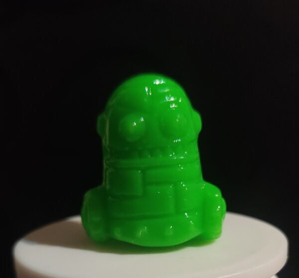 Figura Gogo Crazy Bones original verde fosforescente sobre base blanca, juguete coleccionable vintage de los años 90