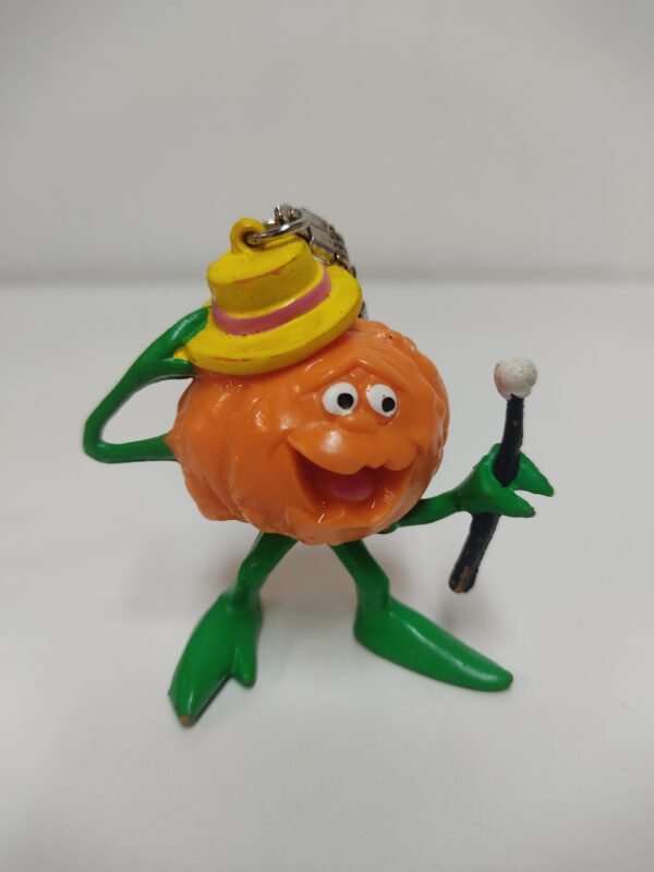 Llavero figura calabaza caricaturesca con bastón y sombrero, estilo Halloween vintage
