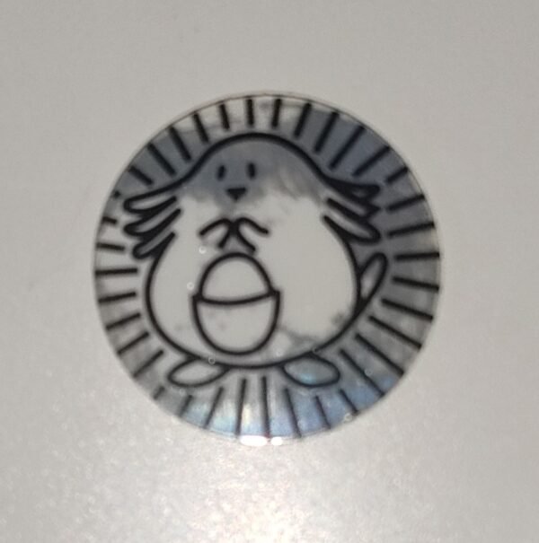 Tazo Pokémon Chansey blanco y negro con diseño óptico holográfico circular