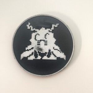 Slammer número 11 de Digimon con diseño pixelado blanco sobre fondo negro estilo retro
