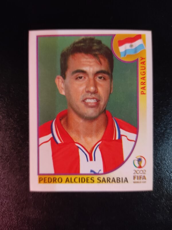 Figurita Panini del Mundial 2002 de Pedro Alcides Sarabia, selección de Paraguay, con camiseta roja y blanca