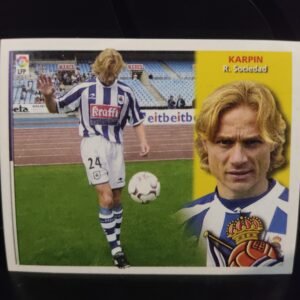 Cromos de jugadores de fútbol de la Liga Española (LaLiga) pertenecientes a diversas temporadas. Cada cromo muestra a un jugador en acción durante un partido o entrenamiento, acompañado de un retrato en primer plano, el nombre del jugador, su equipo y el escudo correspondiente. Los equipos representados incluyen clubes como Real Madrid, Atlético de Madrid, FC Barcelona, Sevilla FC, Real Zaragoza, Deportivo Alavés, Real Sociedad, Real Betis, RCD Mallorca, RC Deportivo, RC Celta, Villarreal CF, Racing de Santander, Real Valladolid y Athletic Club.