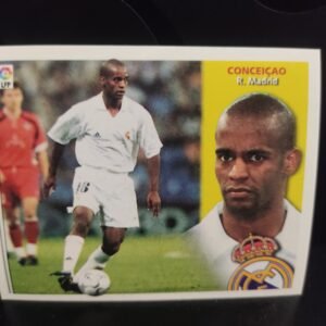 Lote de 8 cromos antiguos de fútbol de la Liga Española (La Liga), temporada 2000s, con jugadores de equipos emblemáticos como Real Madrid, FC Barcelona, RCD Espanyol, Real Valladolid y Deportivo de La Coruña. Cada cromo muestra una imagen del jugador en acción junto a un retrato con el escudo del club.