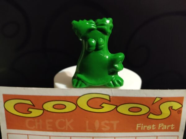 Fotografías de figuras coleccionables Gogo’s Crazy Bones Serie 1 en diversos colores y formas, exhibidas junto a una tarjeta de checklist con el logo oficial.