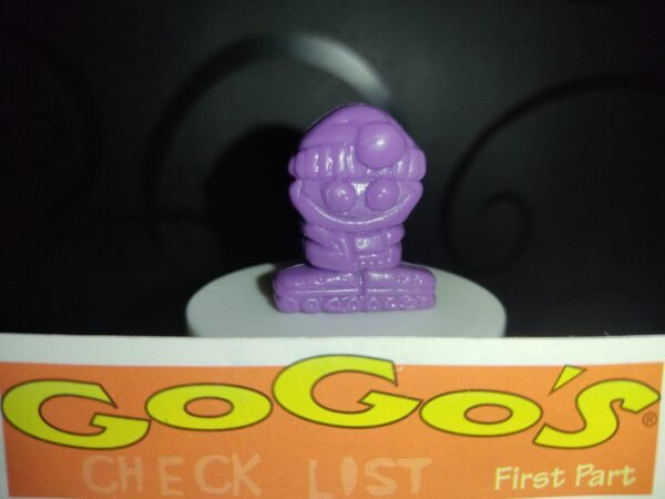 Fotografías de figuras coleccionables Gogo’s Crazy Bones Serie 1 en diversos colores y formas, exhibidas junto a una tarjeta de checklist con el logo oficial.