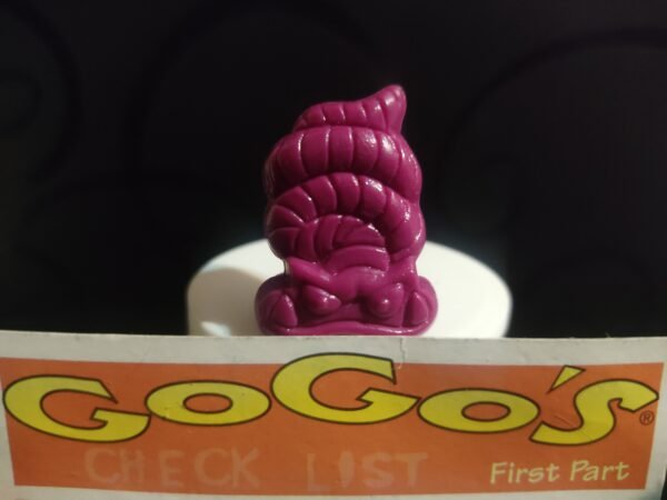 Fotografías de figuras coleccionables Gogo’s Crazy Bones Serie 1 en diversos colores y formas, exhibidas junto a una tarjeta de checklist con el logo oficial.