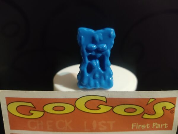 Fotografías de figuras coleccionables Gogo’s Crazy Bones Serie 1 en diversos colores y formas, exhibidas junto a una tarjeta de checklist con el logo oficial.