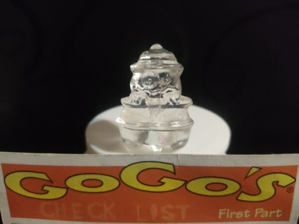 Fotografías de figuras coleccionables Gogo’s Crazy Bones Serie 1 en diversos colores y formas, exhibidas junto a una tarjeta de checklist con el logo oficial.
