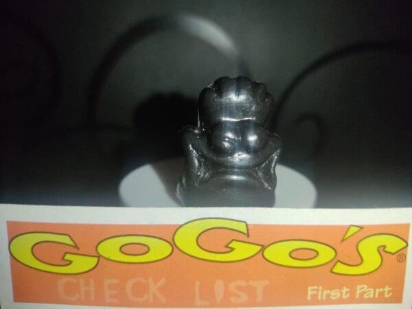 Fotografías de figuras coleccionables Gogo’s Crazy Bones Serie 1 en diversos colores y formas, exhibidas junto a una tarjeta de checklist con el logo oficial.