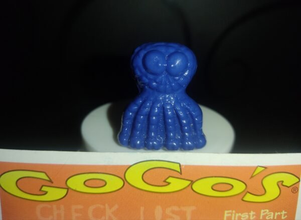 Fotografías de figuras coleccionables Gogo’s Crazy Bones Serie 1 en diversos colores y formas, exhibidas junto a una tarjeta de checklist con el logo oficial.