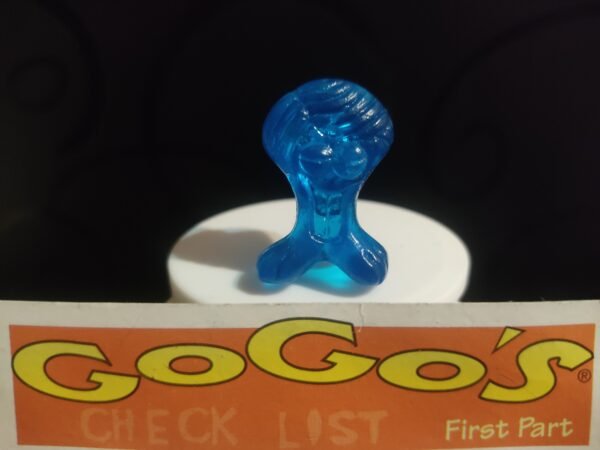 Fotografías de figuras coleccionables Gogo’s Crazy Bones Serie 1 en diversos colores y formas, exhibidas junto a una tarjeta de checklist con el logo oficial.