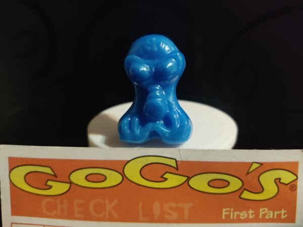 Fotografías de figuras coleccionables Gogo’s Crazy Bones Serie 1 en diversos colores y formas, exhibidas junto a una tarjeta de checklist con el logo oficial.