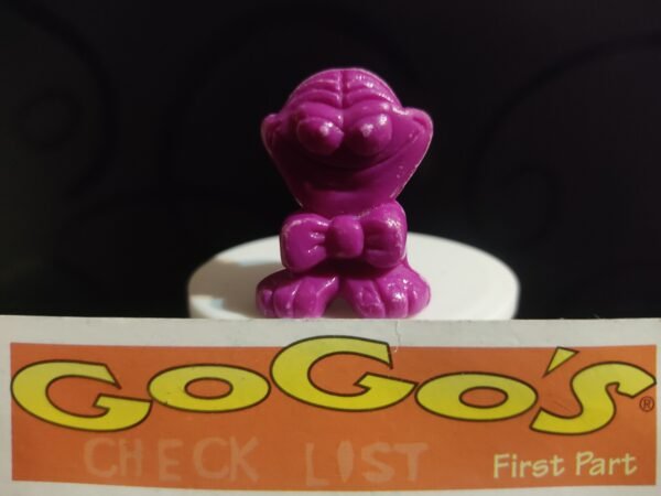Fotografías de figuras coleccionables Gogo’s Crazy Bones Serie 1 en diversos colores y formas, exhibidas junto a una tarjeta de checklist con el logo oficial.
