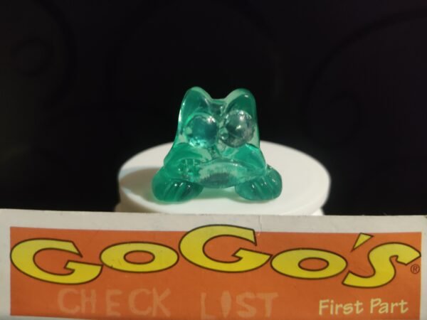 Fotografías de figuras coleccionables Gogo’s Crazy Bones Serie 1 en diversos colores y formas, exhibidas junto a una tarjeta de checklist con el logo oficial.